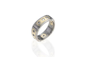 Hinged, Pinch operated, aircraft grade, U.S. made, Titanium, stainless steel, and yellow-gold with diamonds and sapphires openable wedding ring.